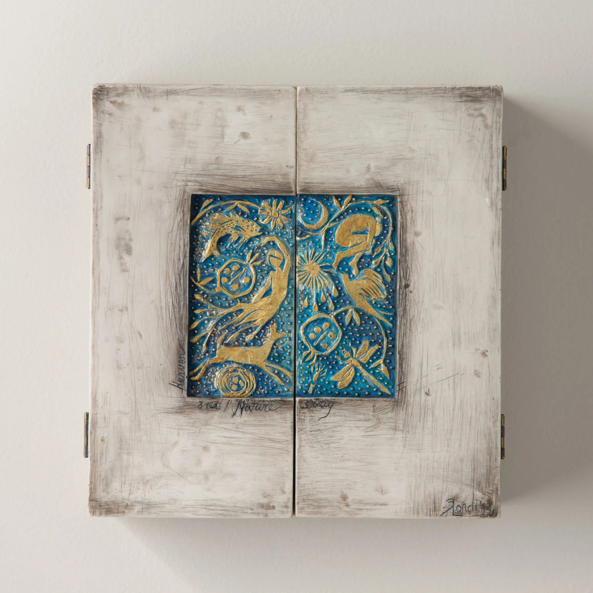 Willow Tree Starry Night Nativity, 8.5”h x 8”w x 2”d resin triptych with hinged doors, cream exterior with gold and blue details, doors open to 16”w with interior bas-relief Nativity scenes